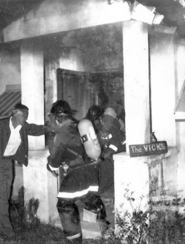 Firefighters Fighting Fire at The Vicks House